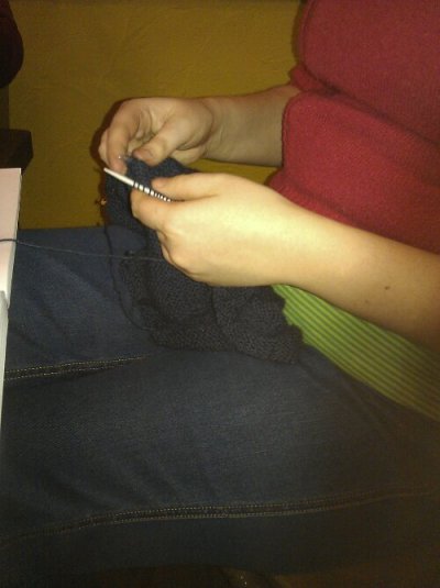 S knitting her first sweater